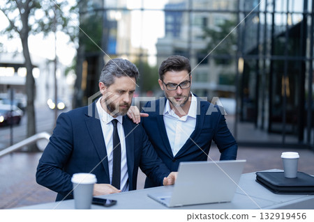 Successful businessmen freelance online. Businessmen freelancing in New York. Freelancer developer do business online. Businessmen. Freelance business success. Freelance online. New business idea 132919456