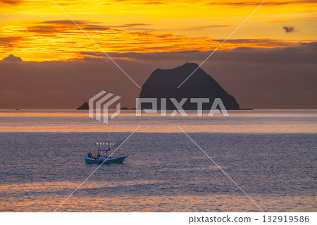 Fishing boat at Keelung Islet coastline in Waimushan, Taiwan. Fishing boat at Keelung Islet coastline in Waimushan, Taiwan. 132919586