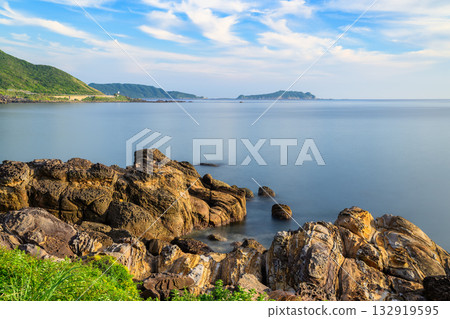 Magical sunrise over Keelung Islet and Waimushan coastline in Taiwan. 132919595