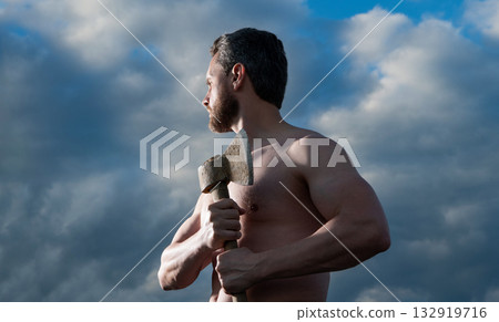 shirtless man with axe. brutally man hold ax. brutal man on sky background shirtless man with axe. brutally man hold ax. brutal man on sky background 132919716