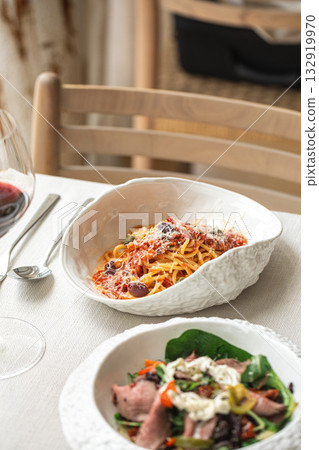 Spaghetti with tomato sauce and parmesan Spaghetti with tomato sauce and parmesan 132919970