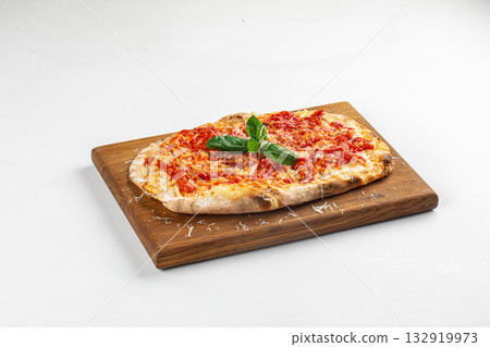 Isolated margherita pizza with basil leaves Isolated margherita pizza with basil leaves 132919973