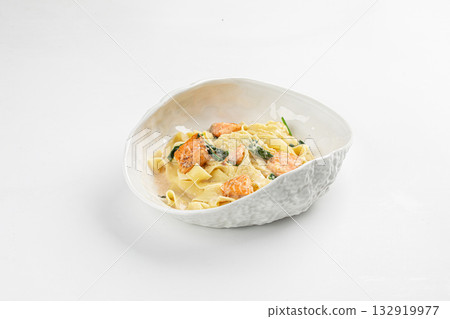 Isolated pasta with salmon and cream sauce Isolated pasta with salmon and cream sauce 132919977