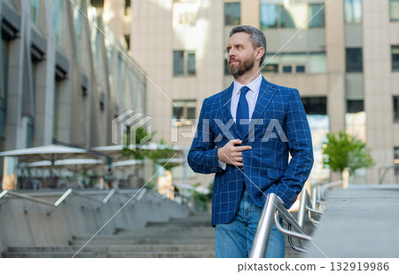 Rich man in suit. Financial district. Business success ambitious man outdoor. Businessman after business successful meeting in city. Business success of businessman. Businessman in formal suit 132919986