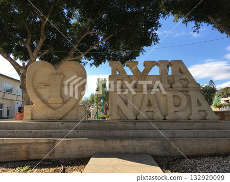 Ayia Napa city landmark with heart sculpture in sunlight. Tourism, Mediterranean destination, and holiday travel experience. Ayia Napa city landmark with heart sculpture in sunlight. Tourism, Mediterranean destination, and holiday travel experience. 132920099