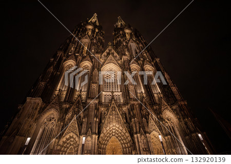 night scene, details of the facade of the Gothic cathedral in the city center, Cologne Dome Church at Germany City. 132920139