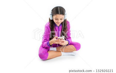 smiling teen girl use music app in studio. teen girl use music app on background. smiling teen girl use music app in studio. teen girl use music app on background. 132920221