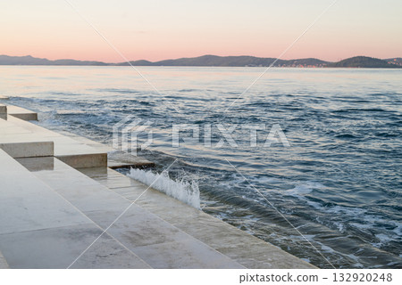The famous landmark of the sea organ steps with the melody of the dawn in the old town of Zadar, Croatia 132920248