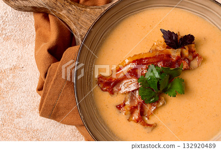 Pumpkin cream soup, curry, fried bacon,, top view, no people, 132920489