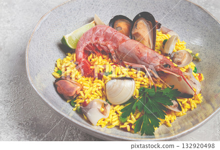 seafood paella, on a plate, traditional Spanish dish, top view, no people, seafood paella, on a plate, traditional Spanish dish, top view, no people, 132920498