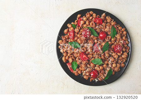 Tuscan pasta with smoked paprika and basil,parmesan cheese, Italian traditional cuisine, 132920520