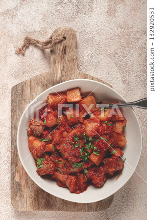 Stew with potatoes and vegetables, in tomato sauce, with spices and herbs, close-up, homemade, no people, Stew with potatoes and vegetables, in tomato sauce, with spices and herbs, close-up, homemade, no people, 132920531