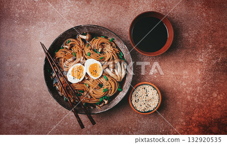 buckwheat noodles, soba, with shimeji mushrooms, boiled egg, green onion, sesame seeds, homemade, no people, 132920535