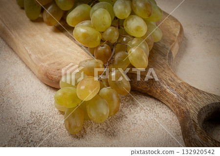 a branch of white grapes, wine grapes, Georgian grape variety Rkatsiteli, top view, 132920542