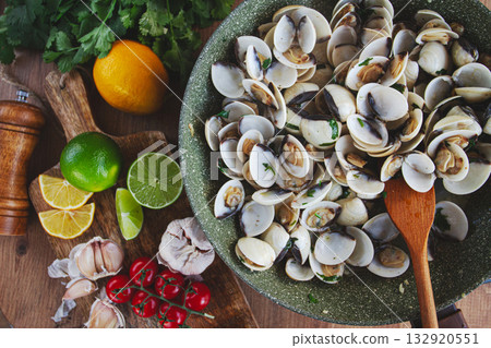 cooking, vongole clams, in a pan with spices and white wine, top view, no people, cooking, vongole clams, in a pan with spices and white wine, top view, no people, 132920551