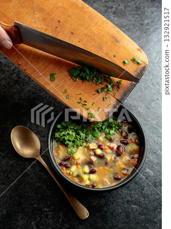 Red bean soup with potatoes, tomatoes, paprika, carrot, and bacon. Red bean soup with potatoes, tomatoes, paprika, carrot, and bacon. 132921517