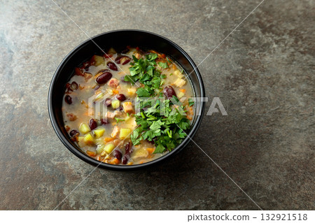 Red bean soup with potatoes, tomatoes, paprika, carrot, and bacon. 132921518