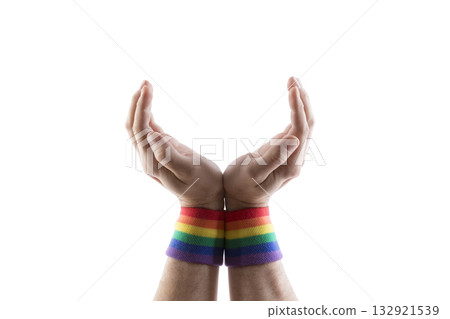Open hands with colorful rainbow LGBT wristband isolated on white background with clipping path. Holding, giving, showing concept. 132921539