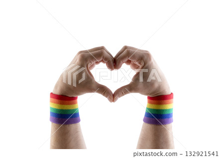 Two hands with colorful rainbow LGBT wristband isolated on white background with clipping path. Two hands with colorful rainbow LGBT wristband isolated on white background with clipping path. 132921541