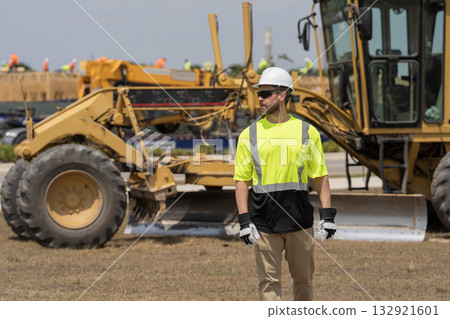Supervisor at object. Worker at construction site. Builder construction man. Worker supervisor heavy machinery. Safety inspection. Industry construction worker. Builder civil engineer at building Supervisor at object. Worker at construction site. Builder construction man. Worker supervisor heavy machinery. Safety inspection. Industry construction worker. Builder civil engineer at building 132921601