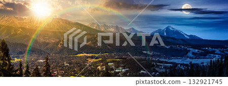 panorama of Mountain range on summer solstice. day and night time change concept. village in the valley with sun and moon. clouds on the sky and rolling hills. duality and transition template panorama of Mountain range on summer solstice. day and night time change concept. village in the valley with sun and moon. clouds on the sky and rolling hills. duality and transition template 132921745