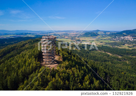 Observation tower in mountain landscape with panoramic forest view 132921926