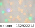 Blurred abstract sparkling multicolored garland background. Holiday backdrop. 132922218