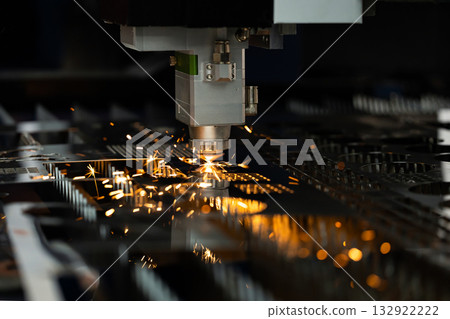 Modern metalworking plant CNC milling machine. Processing and laser cutting for metal in the industrial. Motion blur. Industrial exhibition of machine tools. Modern metalworking plant CNC milling machine. Processing and laser cutting for metal in the industrial. Motion blur. Industrial exhibition of machine tools. 132922222
