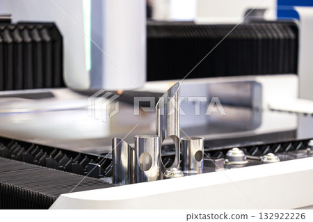 Metal product parts manufactured using a modern metalworking machine. CNC milling machine. International Metalworking Exhibition. Metal product parts manufactured using a modern metalworking machine. CNC milling machine. International Metalworking Exhibition. 132922226