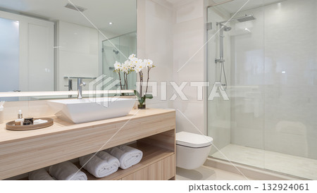 Stylish Bathroom with Modern Fixtures and Orchids Decoration 132924061