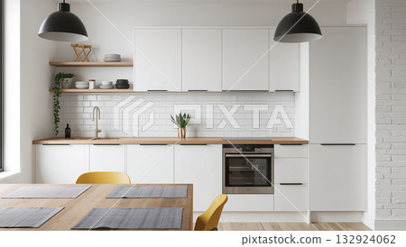 Modern kitchen interior with white cabinets, wooden countertops, and stylish decor 132924062