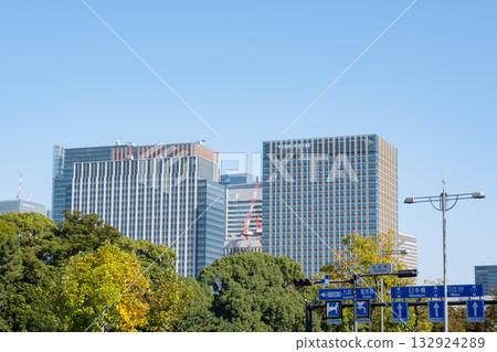 Road sign and skyscrapers in Marunouchi Road sign and skyscrapers in Marunouchi 132924289