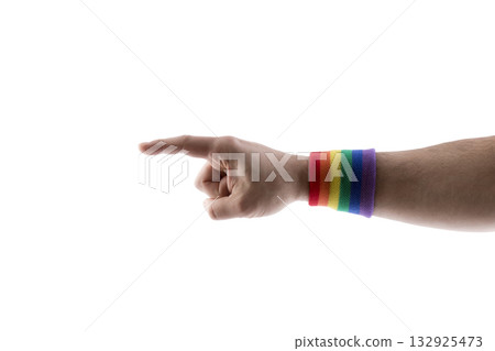 Hand pointing with colorful rainbow LGBT wristband isolated on white background with clipping path 132925473