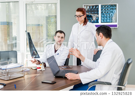 Doctors team having medical council in hospital.  132925828