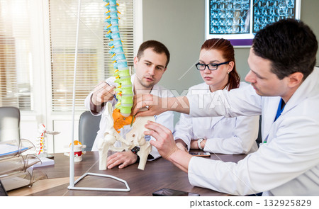 Doctors team having medical council in hospital.  132925829