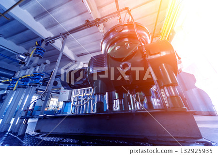 Interior of modern natural oil factory. The piping, pumps and motors Interior of modern natural oil factory. The piping, pumps and motors 132925935