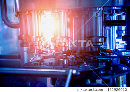 Bottling line of sunflower oil in bottles. Vegetable oil production plant.  132926010