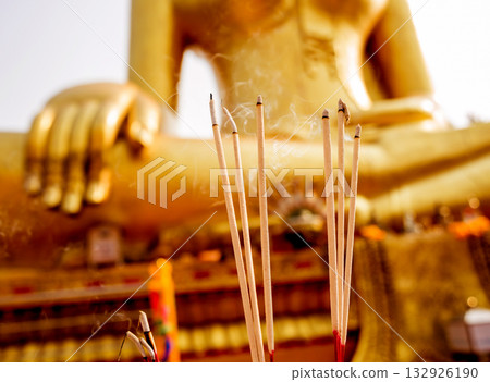 Symbols of Buddhism. Burning incense sticks. South-Eastern Asia.  132926190