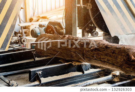 Modern sawmill. Industry sawing boards from logs Modern sawmill. Industry sawing boards from logs 132926303