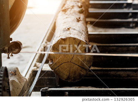 Modern sawmill. Industry sawing boards from logs Modern sawmill. Industry sawing boards from logs 132926305