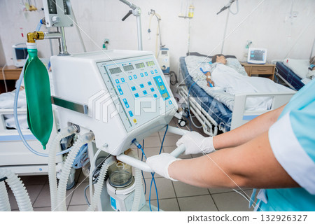 Doctor give resuscitation to patient in the emergency room. Cardiac massage 132926327