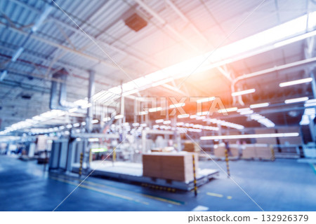 Bloored background of production line of the wooden floor factory. CNC automatic Bloored background of production line of the wooden floor factory. CNC automatic 132926379