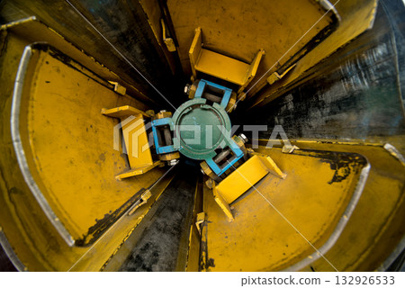 Rolled steel coils in storage areas of metalwork manufacturing. Rolled steel coils in storage areas of metalwork manufacturing. 132926533
