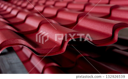 Red metallic roof tiles background with drops of water. Red metallic roof tiles background with drops of water. 132926539