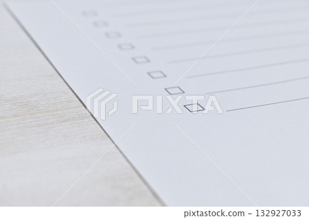 Close-up of a to-do list paper with blank checkboxes Close-up of a to-do list paper with blank checkboxes 132927033