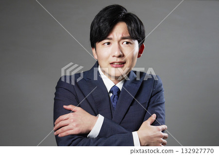 Businessman cold black background Businessman cold black background 132927770