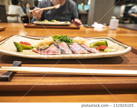 A Japanese meal filled with the aroma of seasonal ingredients 132928105