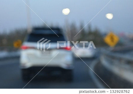 highway traffic with safety barrier on road asphalt, blurred image highway traffic with safety barrier on road asphalt, blurred image 132928762
