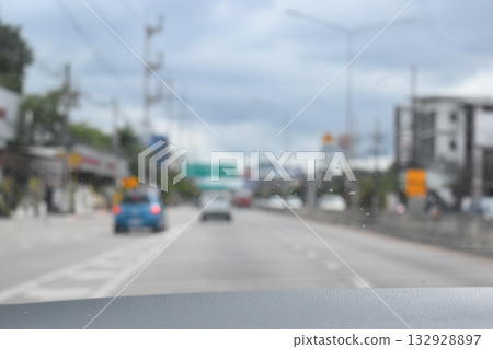 highway traffic with safety barrier on road asphalt, blurred image highway traffic with safety barrier on road asphalt, blurred image 132928897
