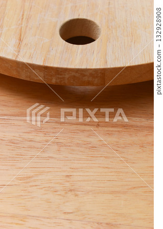 brown wooden sphere cuttingboard wood background 132928908